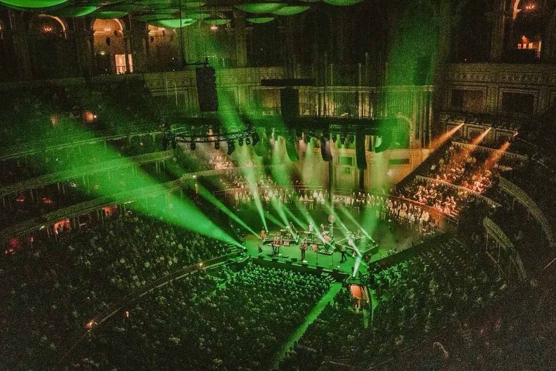 The Royal Albert Hall from high in the gallery, green stage lights sweeping over a full house as Stornoway play.